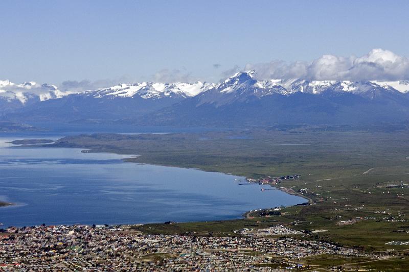 20071213 095713 D200 c3600x2400.jpg - Flight from Punta Arenas to Puerto Natales; arriving at Puerto Natales with snow capped mountains in background